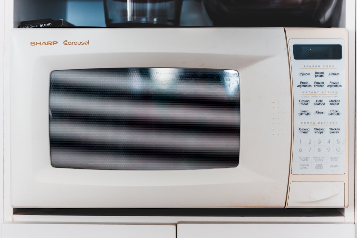 Stainless steel over-the-range microwave installed in a Rocky Mount NC kitchen